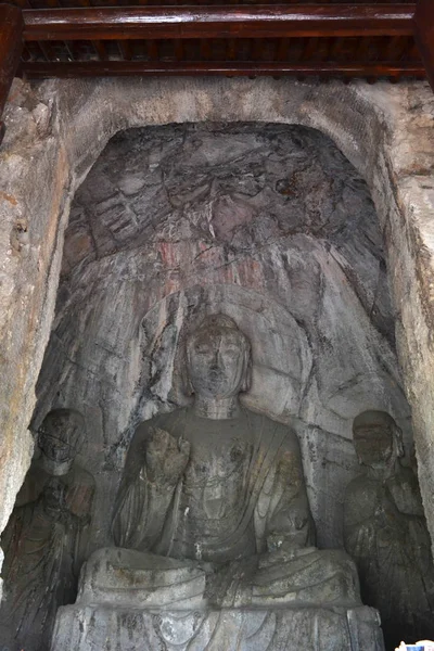 The holes (with Buddha statue inside) -which is more than thousa — Stock Photo, Image
