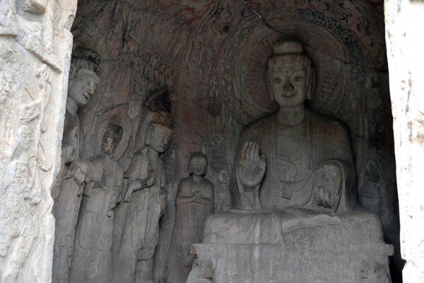 The holes (with Buddha statue inside) -which is more than thousa
