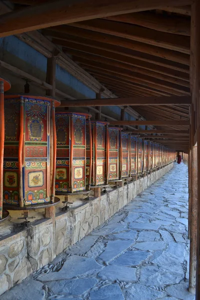 The Tibetan kora or pilgrimage and prayer wheels in Xiahe (Labra