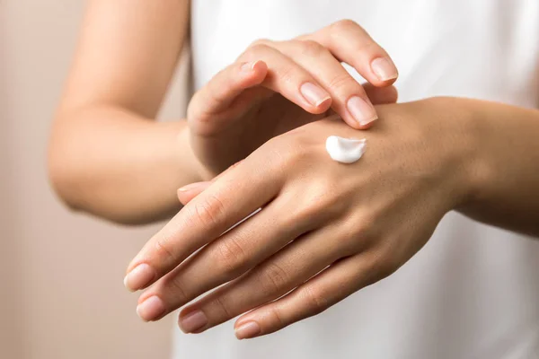 Skincare. close up view of woman hand moisturising them with cream. skincare — 스톡 사진