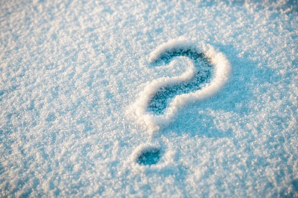 Question mark drawn on snow. will it snow — Stok fotoğraf