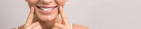 Closeup view of female wide cheerful smile with white teeth and clean skin and copyspace — Stock Photo, Image