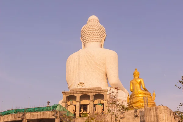 Back view of Phuket Big Buddha Statue while surrounding area under construction
