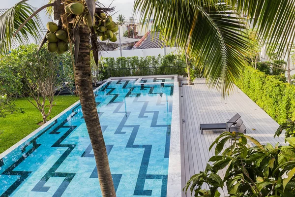 Phuket, Thailand - April 19, 2017: The swimming pool of the Little Nyonya Hotel, the beautiful Sino-Portuguese style hotel. It is the unique destination for many tourists.