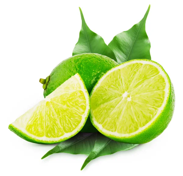 Fatias inteiras e de limão com folhas verdes — Fotografia de Stock