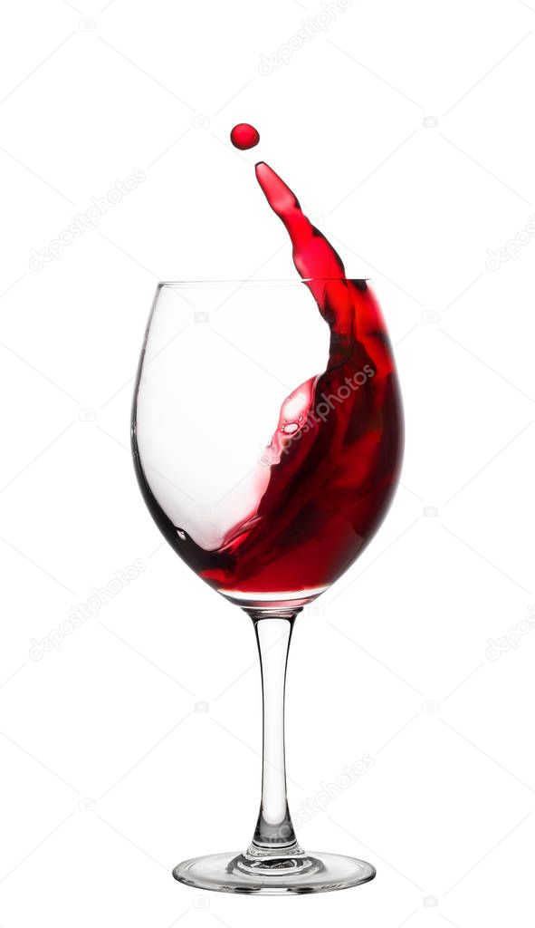 Glass with a splash of red wine