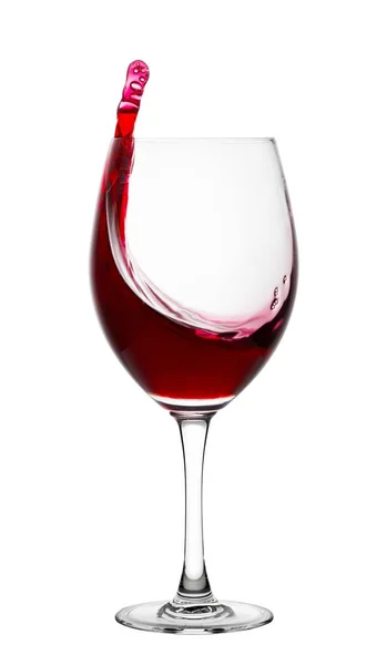 Spetter rode wijn in een glas — Stockfoto