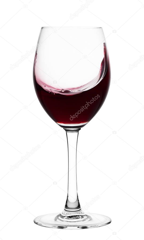 Splash of wine in glass goblet