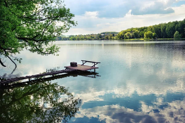 Wooden pier for fishing on the lake — Stock Photo, Image