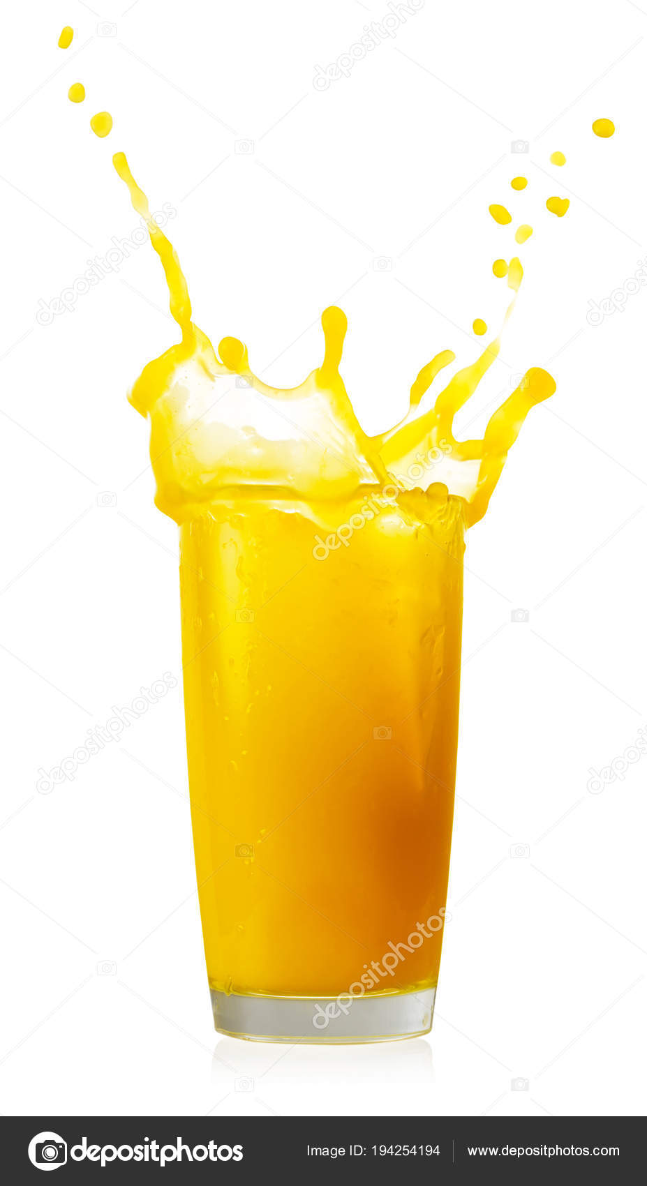 Download Splash of orange juice in high glass — Stock Photo © alexlukin #194254194