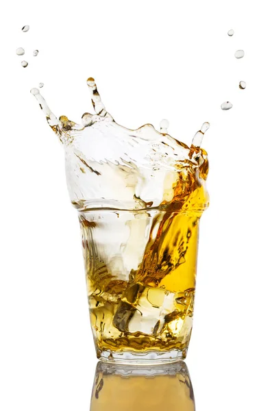 Glass of apple juice with splash — Stock Photo, Image