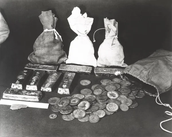 Gold coins on table — Stock Photo, Image