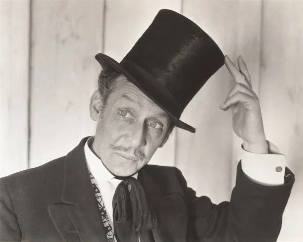 Homem usando chapéu superior — Fotografia de Stock