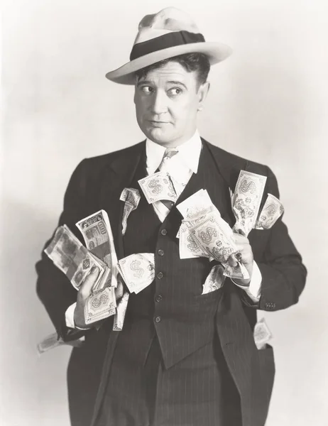 Man holding cash — Stock Photo, Image