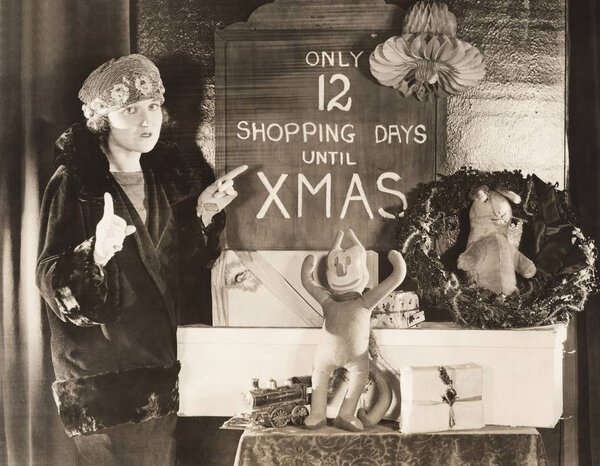 woman standing at table during Christmas