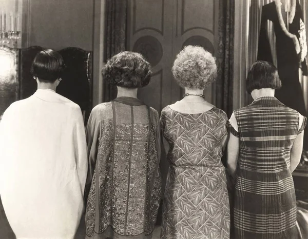 Women standing together at home Stock Image