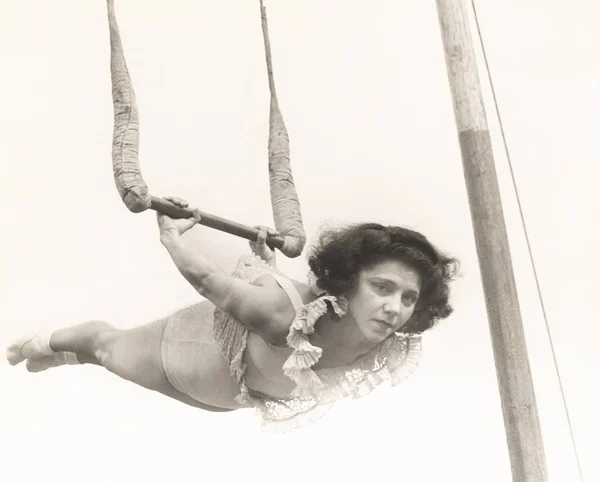 Trapeze artist performing Stock Picture