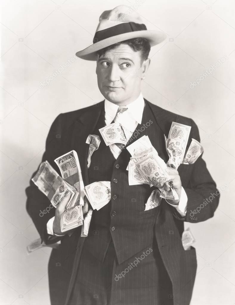man holding cash