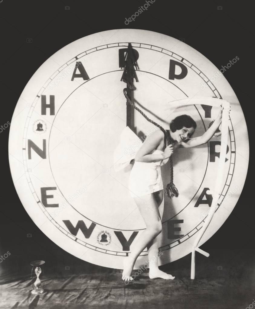 woman pulling hour hand of clock