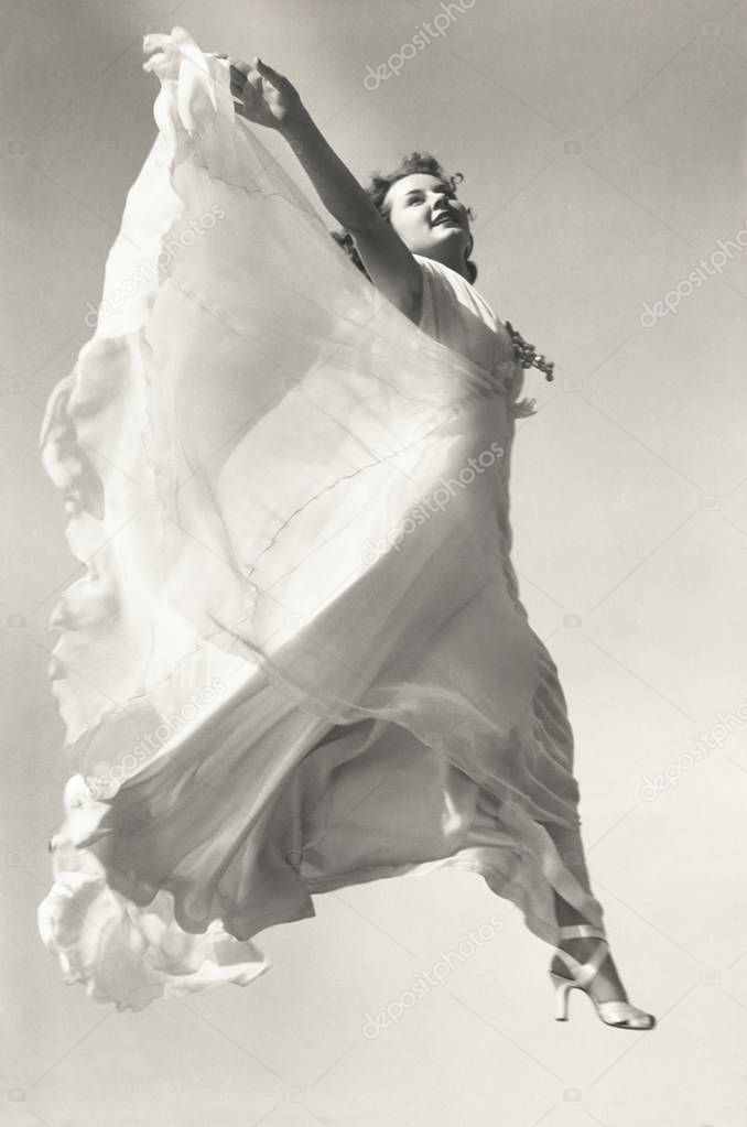 woman  jumping against sky