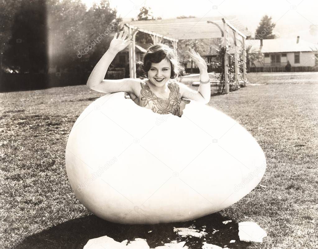 woman in large Easter egg