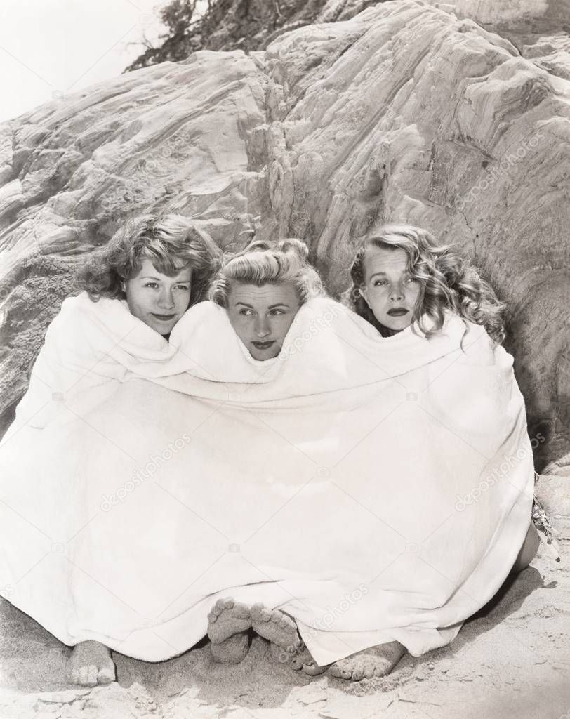 women wrapped in blanket