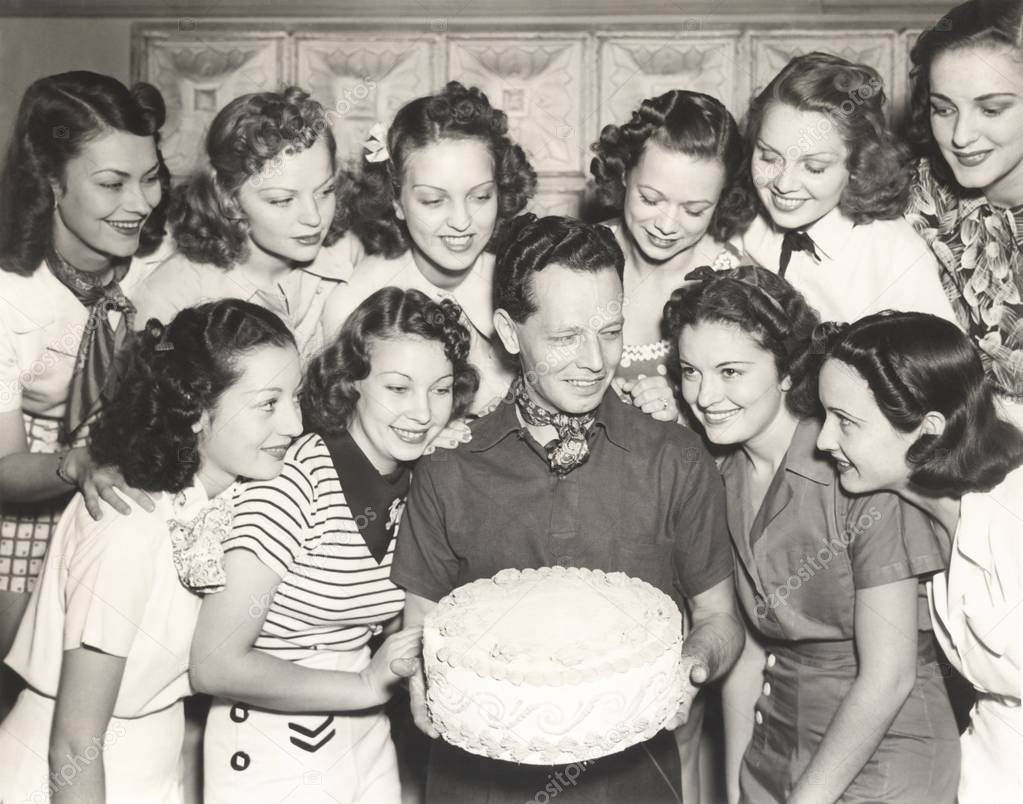 man holding cake
