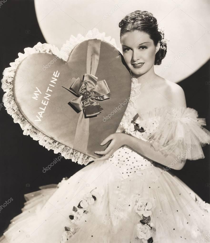 woman holding Valentine's gift