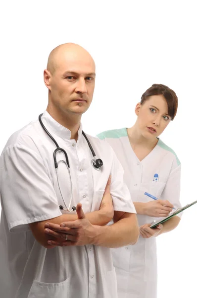 Joven Médico Dictando Notas Enfermera —  Fotos de Stock