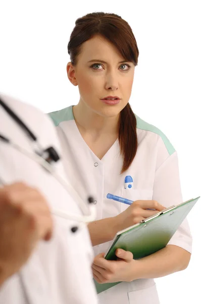 Enfermera Médica Pensando Qué Escribir Sobre Paciente —  Fotos de Stock