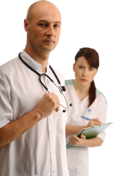 Dva Lékaři Poznámkami Stetoskopem — Stock fotografie