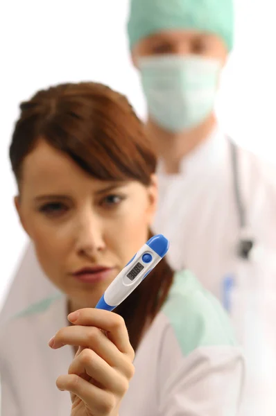 Young Nurse Showing Thermometer Doctor — Stock Photo, Image