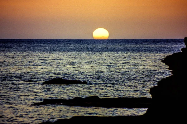 Coucher de soleil au large des Caraïbes — Photo