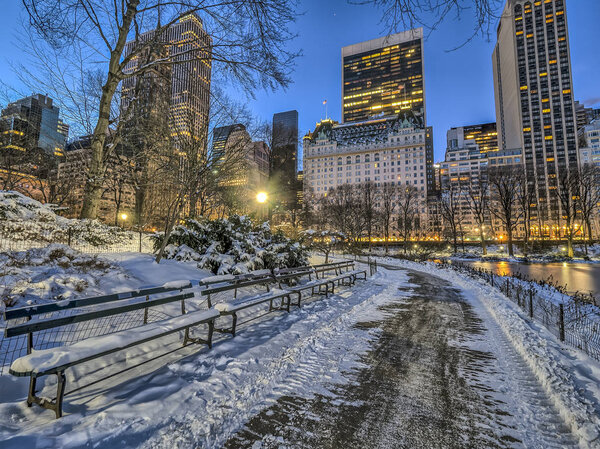 Central Park, New York City at night after snow storm