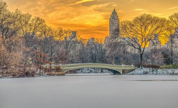 The Bow Bridge is a cast iron bridge located in Central Park, New York City, crossing over The Lake