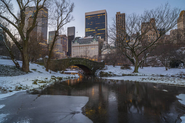 Gapstow Bridge in Central Park in winter after snow storm