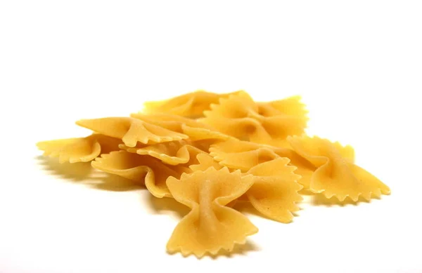 Etwas rohe Pasta mit weißem Hintergrund Stockfoto