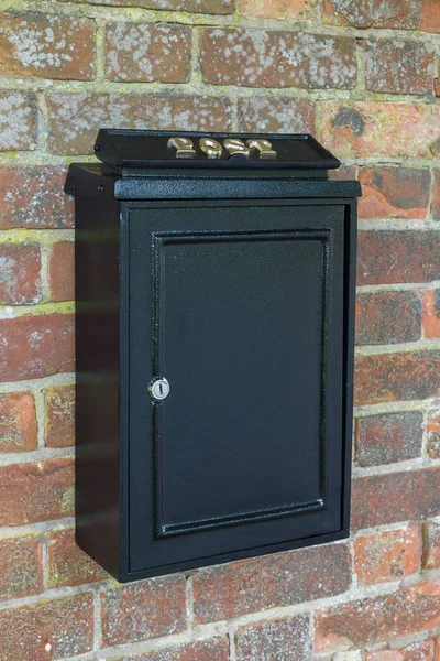 Vintage Black Post Box Letterbox Brick Wall England — Stock Photo, Image