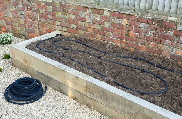 英国蔬菜园安装浸渍软管 灌溉系统 — 图库照片