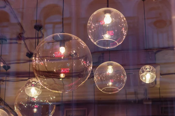 Transparent round lampshades with incandescent bulbs. design illumination — 스톡 사진