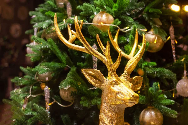 big deer in gold figurine christmas tree decor . interrior noel disign