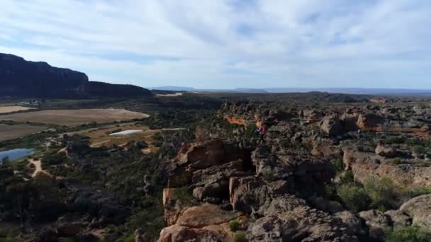 Male Rock Climber Standing Rocky Mountain Countryside — Stock Video