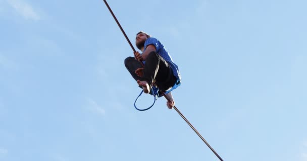 Low Angle View Highline Athlete Balancing Slack Line Tight Rope — Stock Video