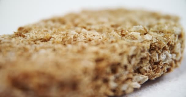 Närbild Granola Bar Vit Bakgrund — Stockvideo