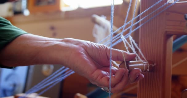 Senior Woman Placing Woollen Thread Weaving Machine Workshop — Stock Video