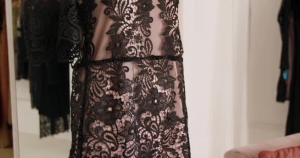 black lace dress with pink underlay