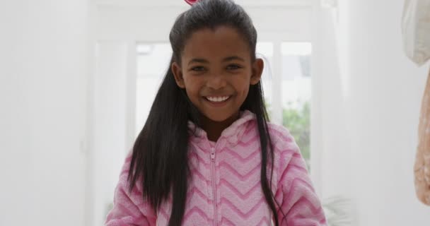 Portrait Young African American Girl Home Wearing Pink Onesie Smiling — 비디오