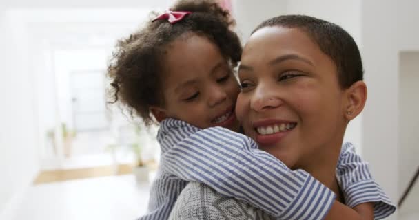 Portrait Close African American Woman Piggybacking Her Young Daughter Corridor — Stock Video