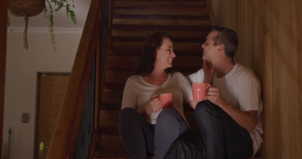 Front View Caucasian Couple Home Sitting Side Side Stairs Holding — Stock Video