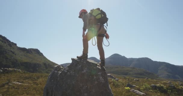 Side View Young Caucasian Man Standing Top Mountain Zip Lining — 图库视频影像